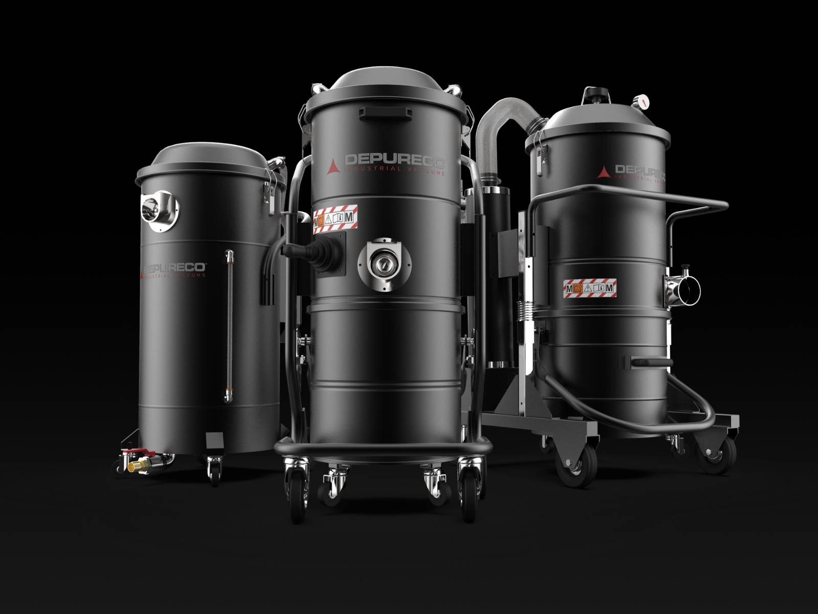 Three Depureco pneumatic (compressed-air) industrial vacuums on wheeled frames, one with a coiled hose, studio backdrop.