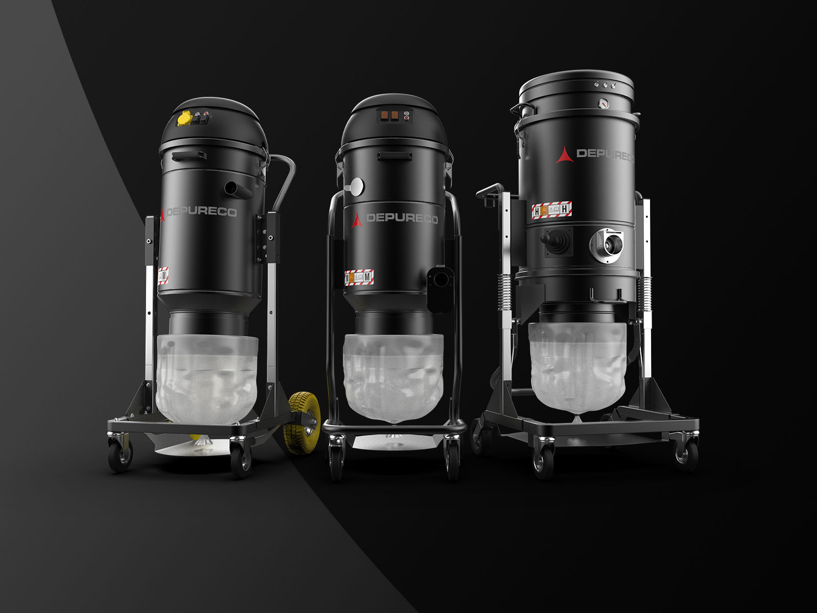 Three Depureco industrial vacuums with Longopac® endless bag (continuous liner) collection on wheeled frames, studio backdrop.